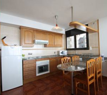 Kitchen in Apartments Caprici