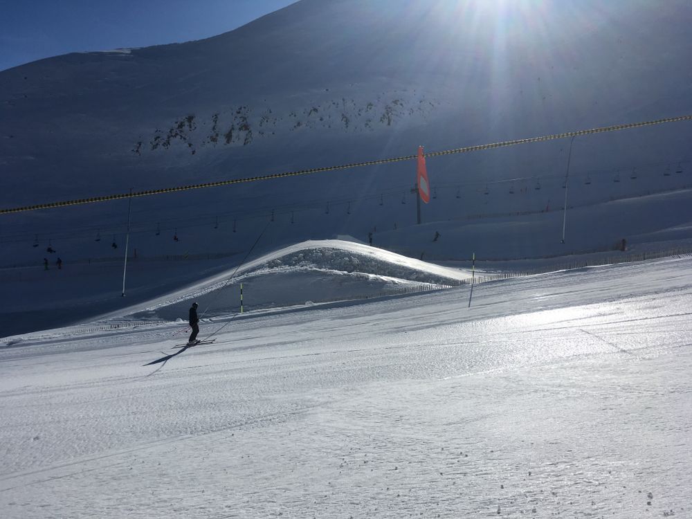 Sun beaming down on the snowpark