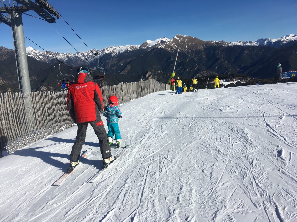 Children having a lesson with the ski intructor