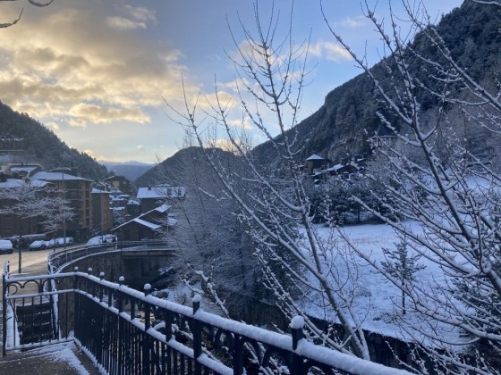 Sunrise at the village of Arinsal after the snowfall
