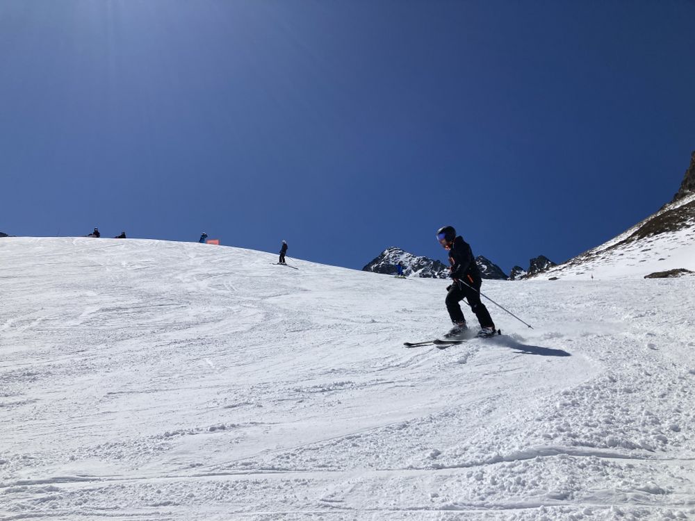Skiing down Els Orris green run