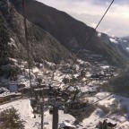 Heading up the gondola of Arinsal with stunnng views of the village covered in white