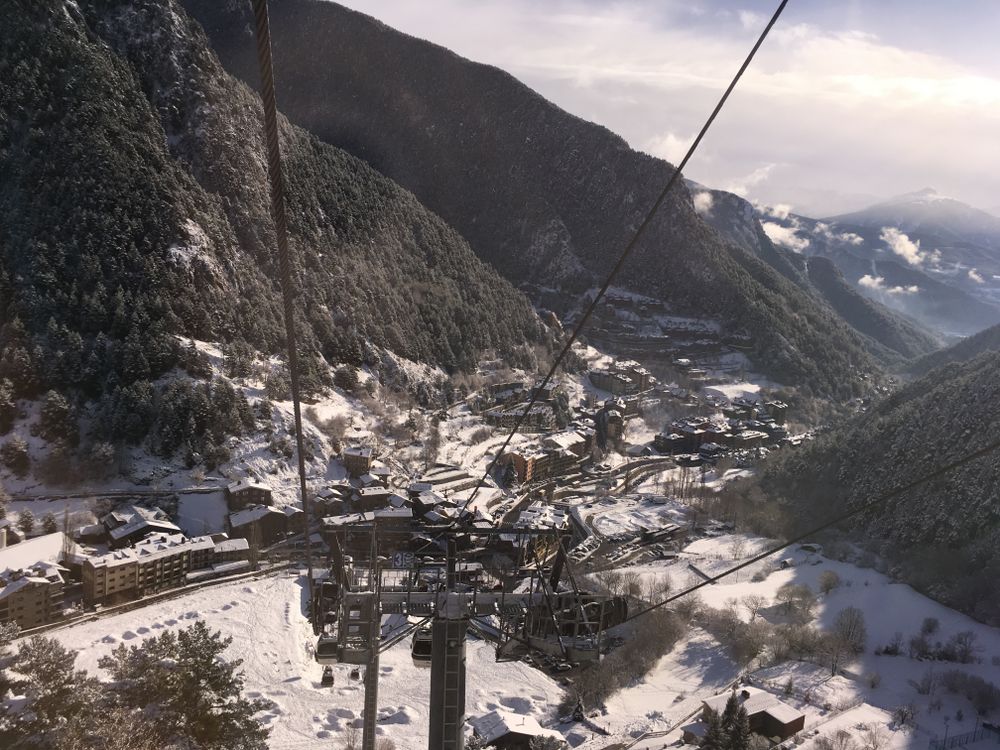 Heading up the gondola of Arinsal with stunnng views of the village covered in white