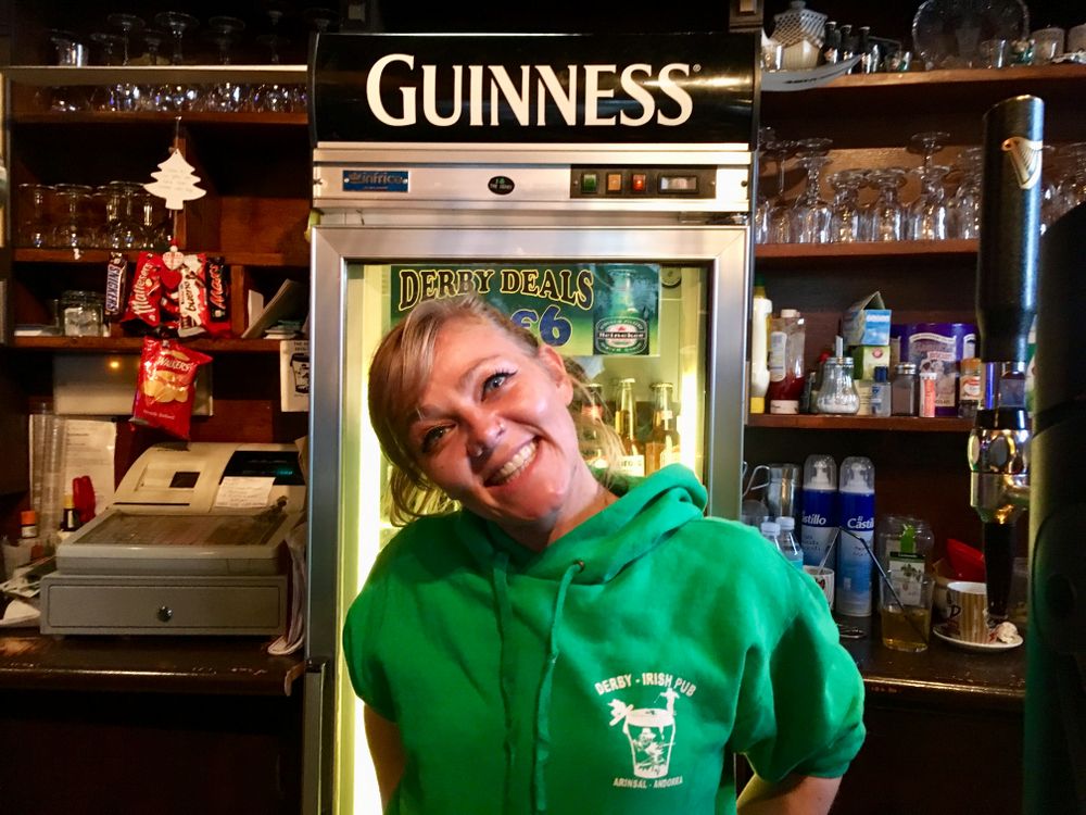 Annie behind the bar of The Derby Irish Bar