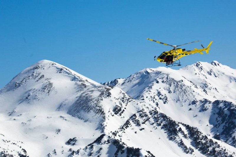 Helicopter flying over the mountains