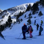 Skiing down the freeride area in Arcalis