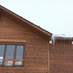Small icicles falling off the roof of Xalet Igloo